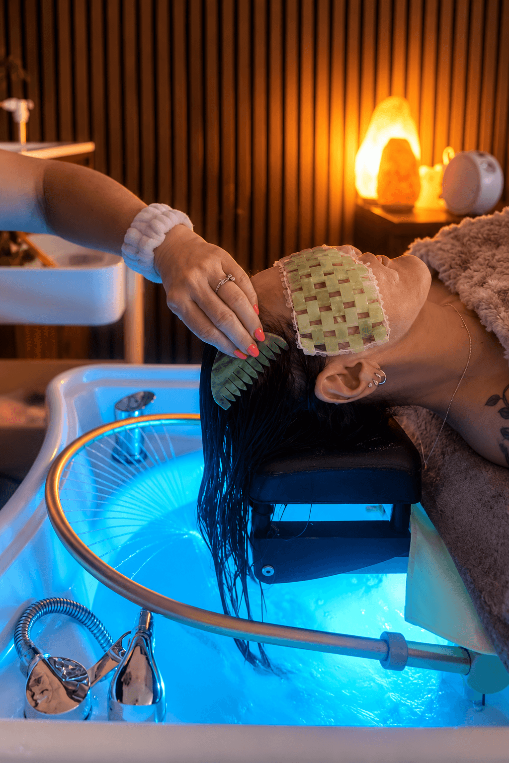 Cloud 9 Head Spa treatment with therapist working through a client's hair